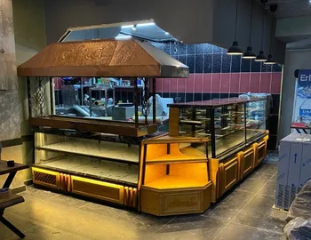 Özel el işlemeli bakır davlumbazlı, L tipi köşe dönüşlü, ahşap dekorlu, ekmeklik raflı ve led aydınlatmalı komple ocakbaşı ve döner servis tezgahı